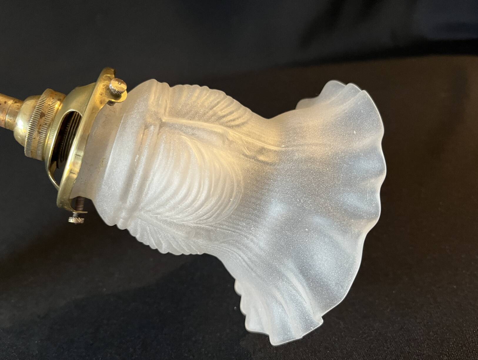 20th century Louis XVI style swan neck wall light in arabesque bronze and pleated glass tulip.