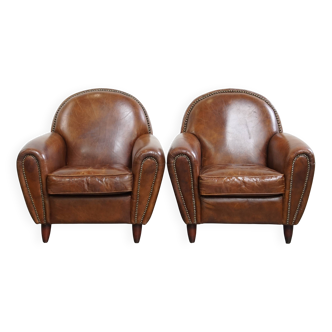 Lot de 2 fauteuils design en cuir de vache
