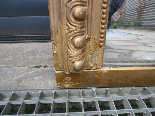 Golden mirror 19th with pediment