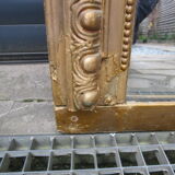 Golden mirror 19th with pediment