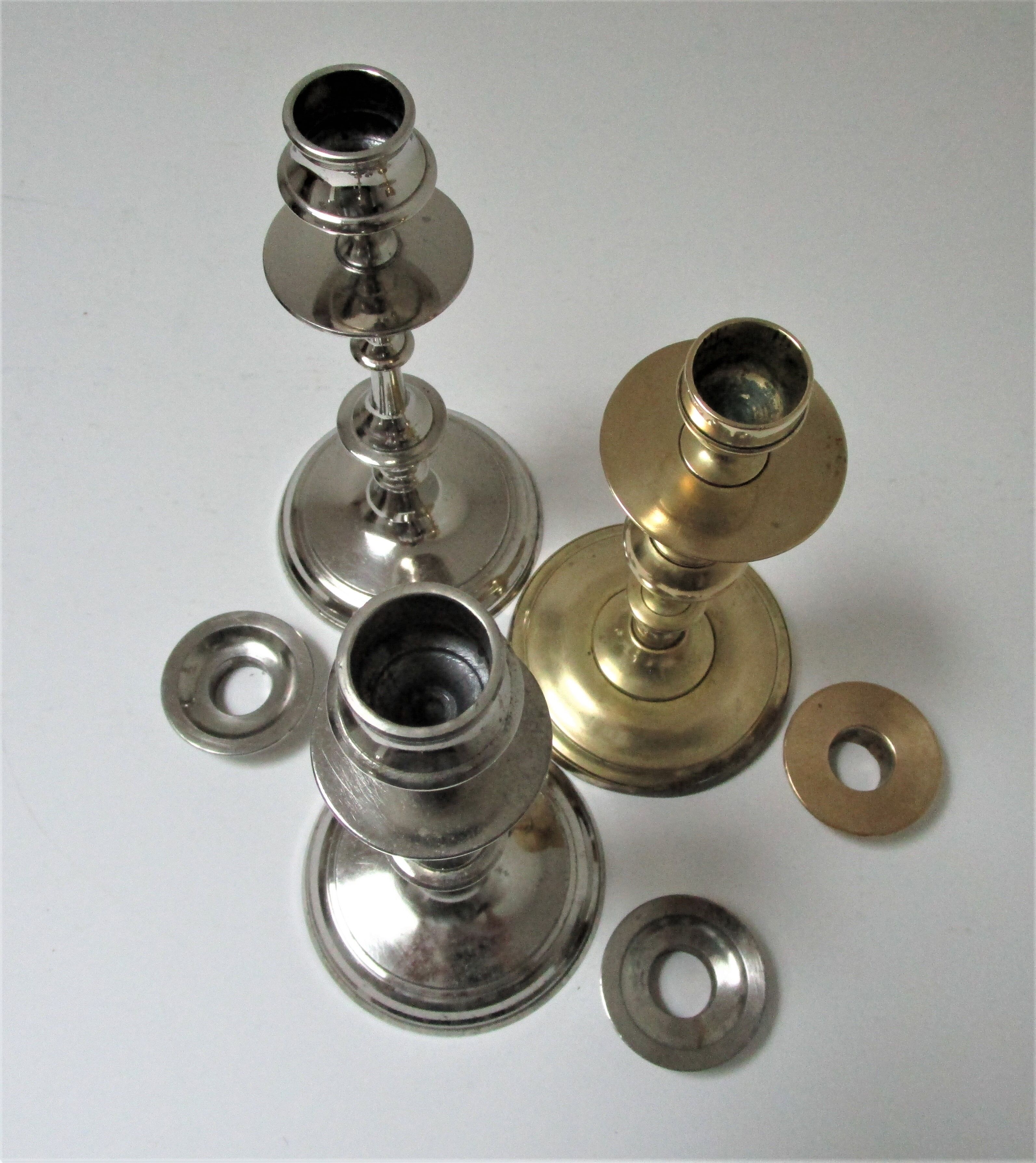 three brass and chrome candle holders early twentieth century