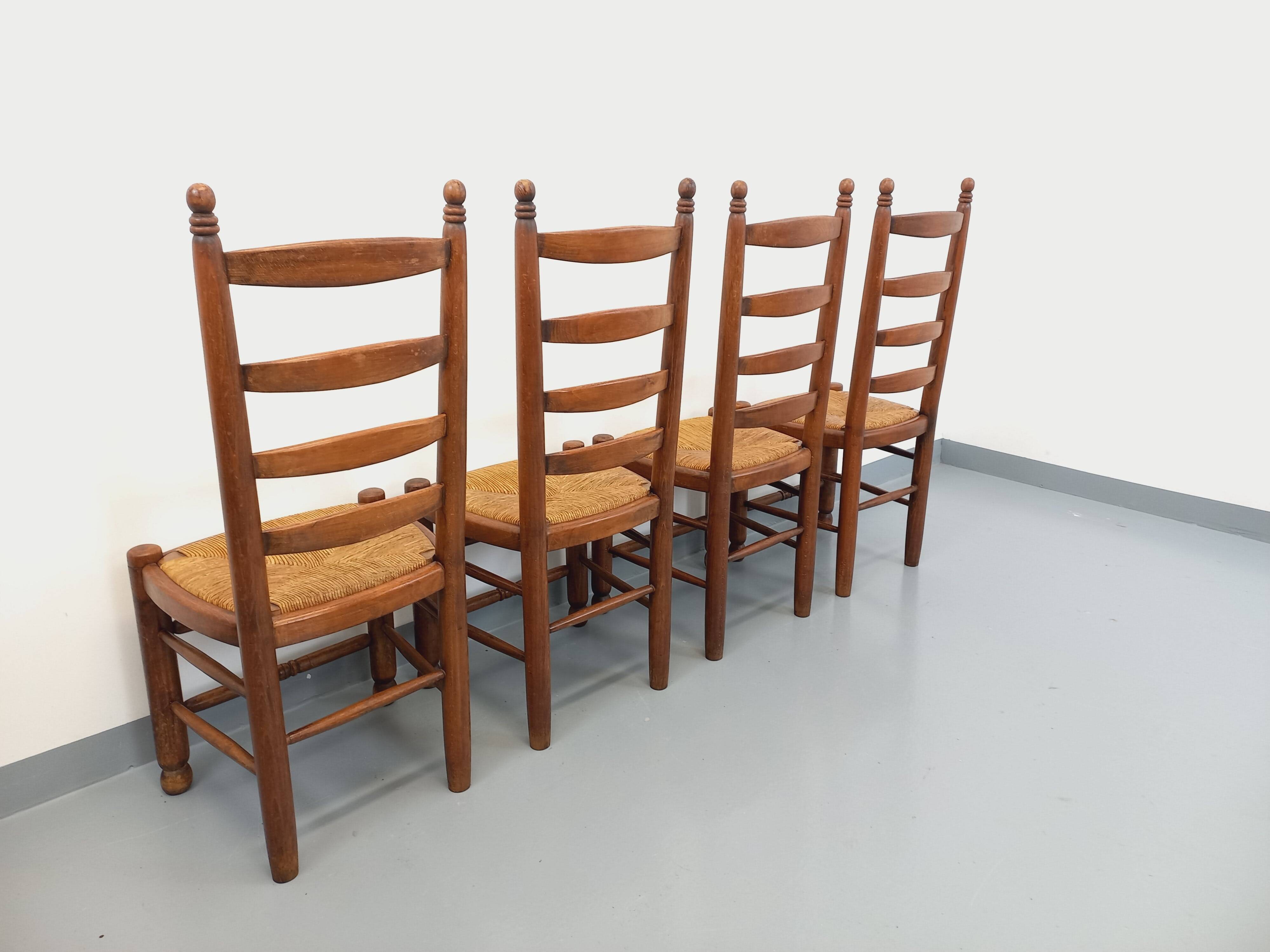 Set of 4 vintage brutalist Charles Dudouyt chairs in wood and straw from the 60s