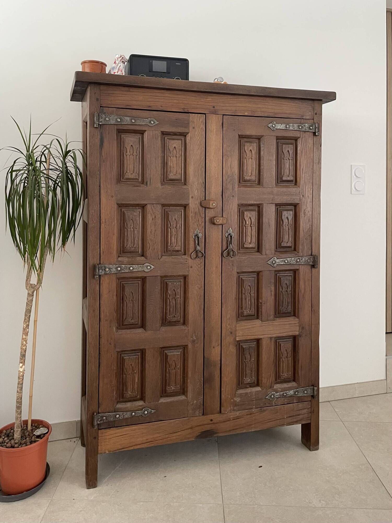 Tuscan baroque storage cabinet with 2 carved doors.