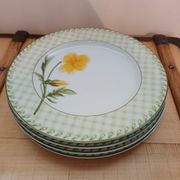 4 assiettes en porcelaine vintages