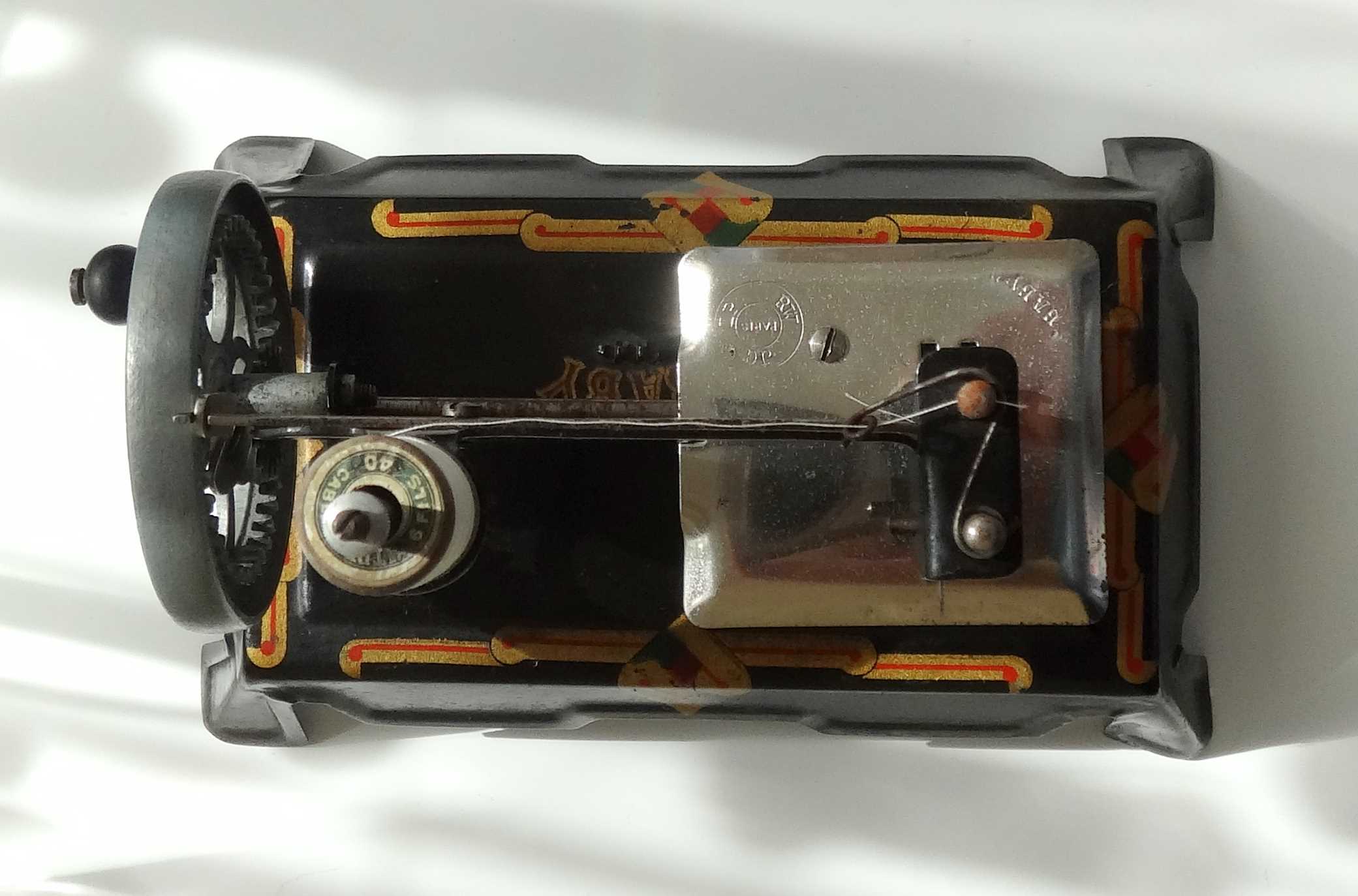 Baby sewing machine years 20-30