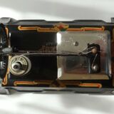 Baby sewing machine years 20-30