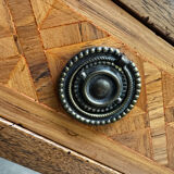 Cylinder desk with marquetry featuring a crosshatch design.