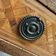 Cylinder desk with marquetry featuring a crosshatch design.