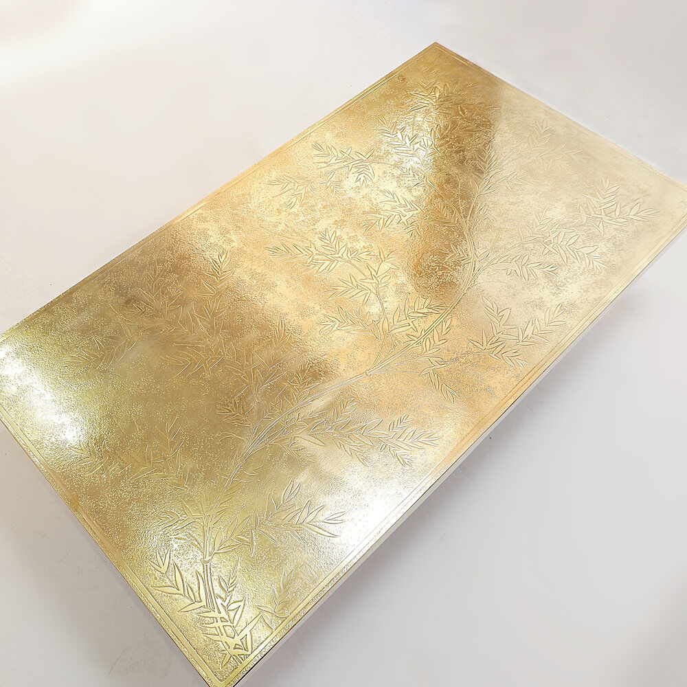 Brass coffee table engraved in the style of Christian Krekels, Belgium 1977.