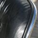 POLLOCK black leather reclining armchair with casters