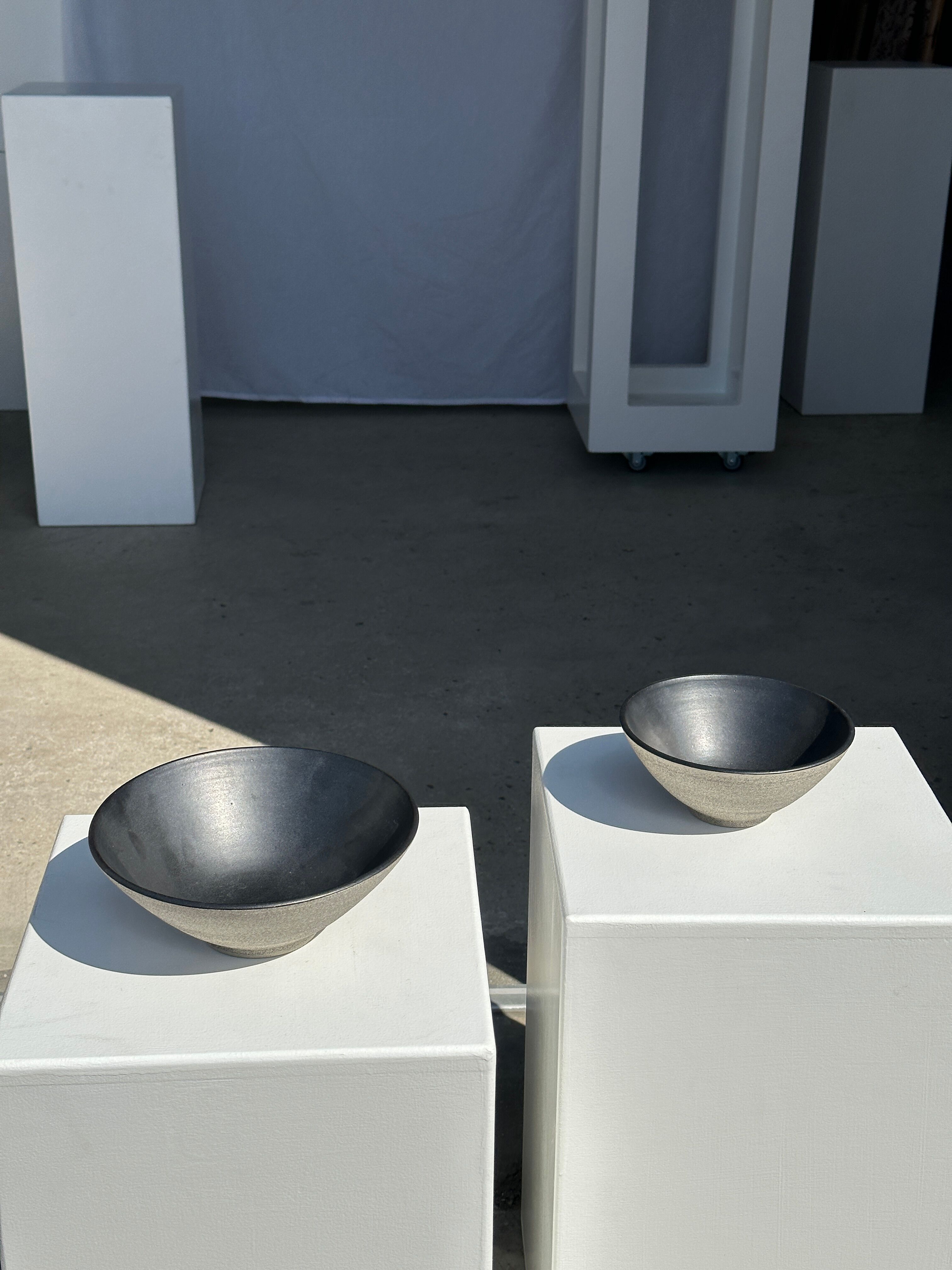 Duo of gray Indonesian ceramic bowls or salad bowls