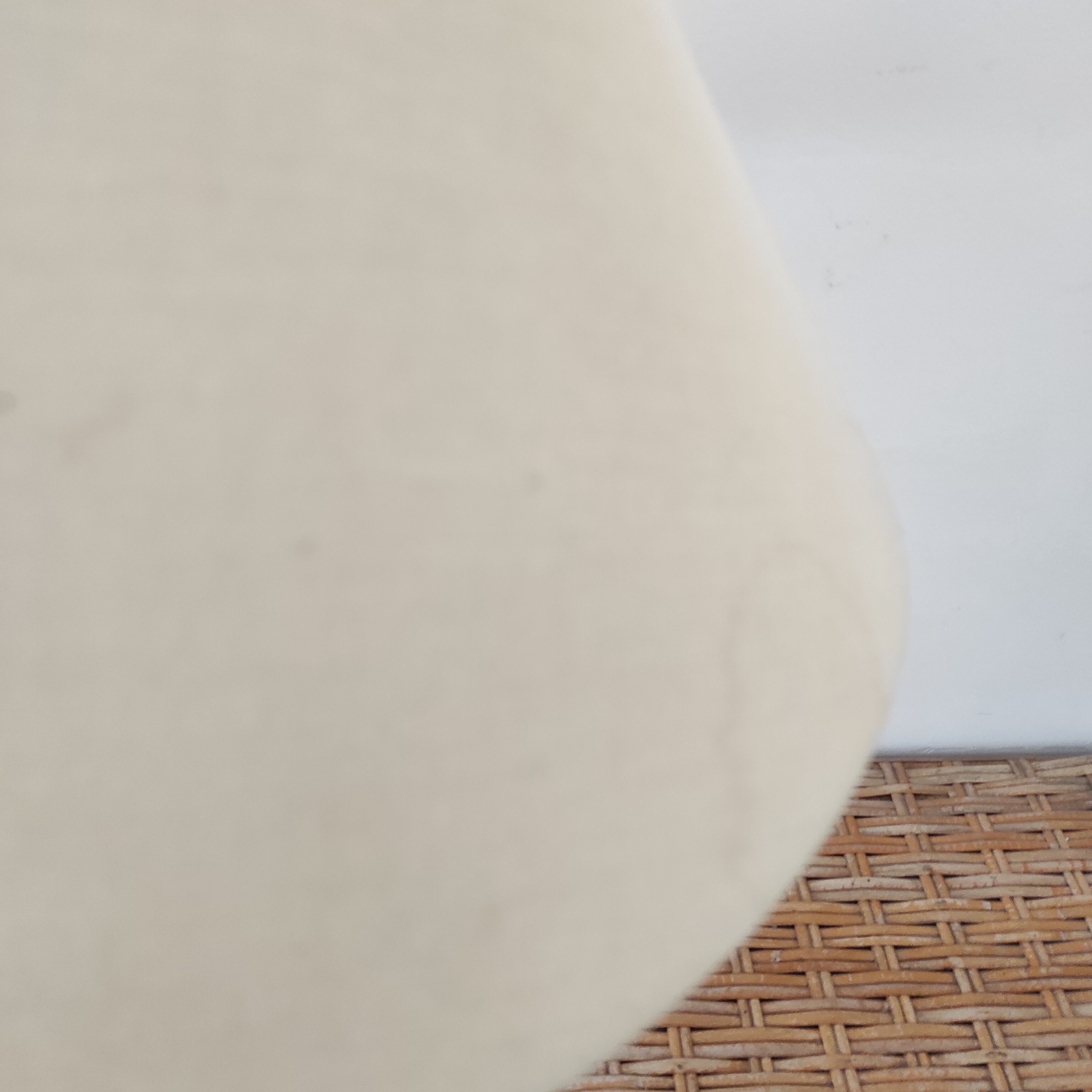 Black wrought iron table lamp and beige lampshade