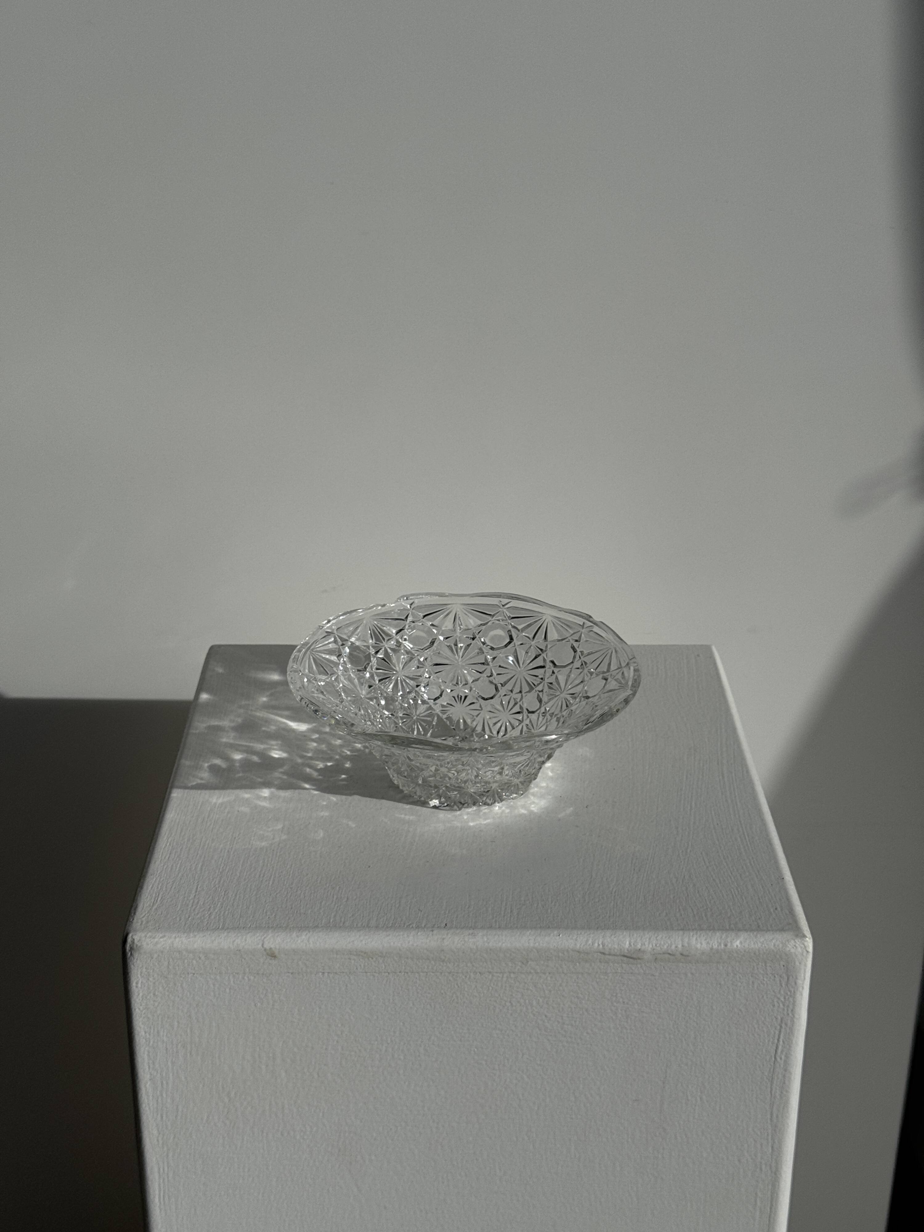 Small glass dish with vintage diamond points, a sparkle.