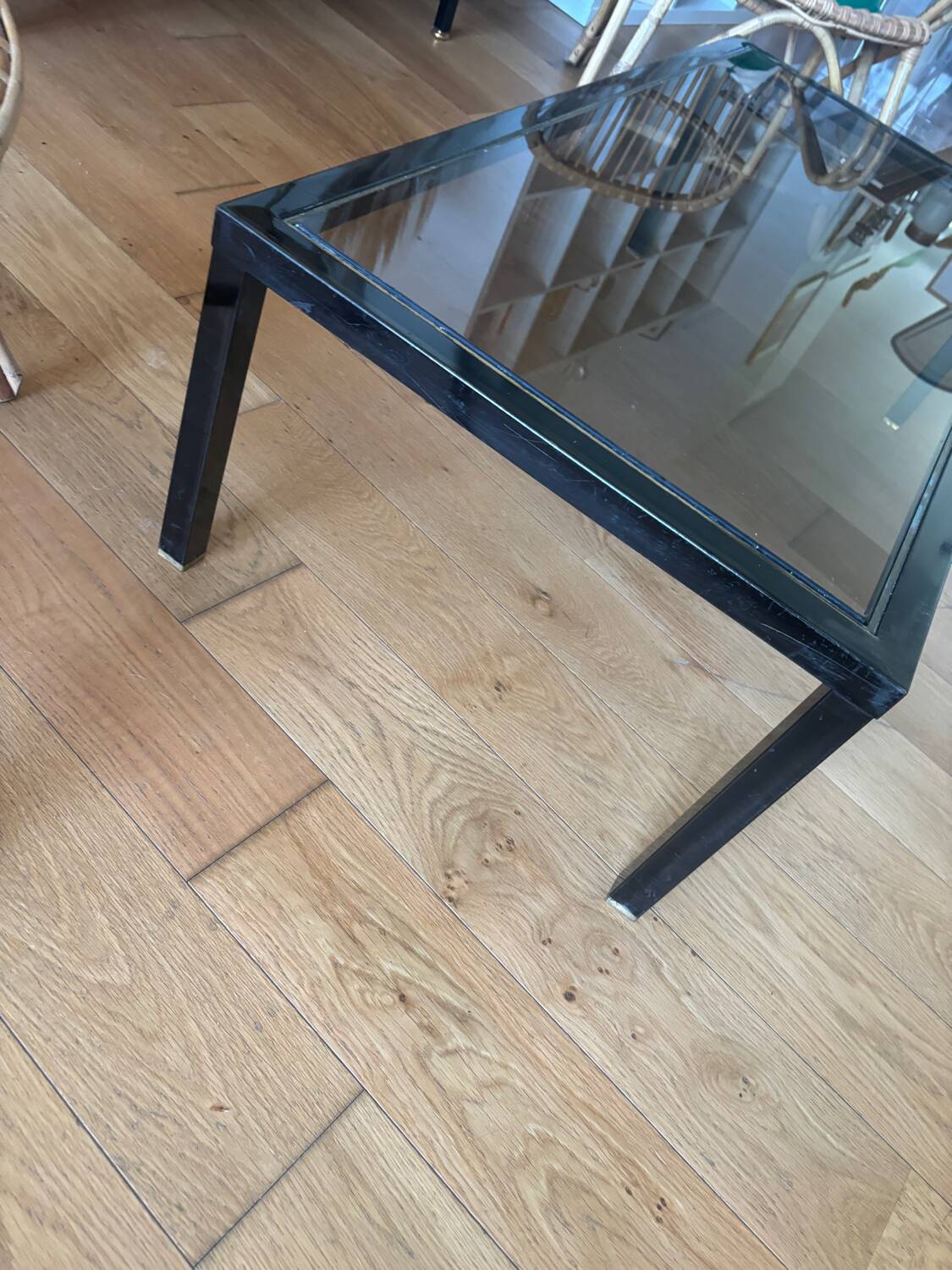 Smoked glass coffee table with chrome metal.