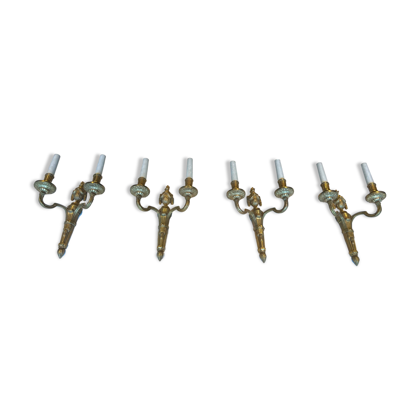 Set of 4 bronze wall lights in Louis XVI style.