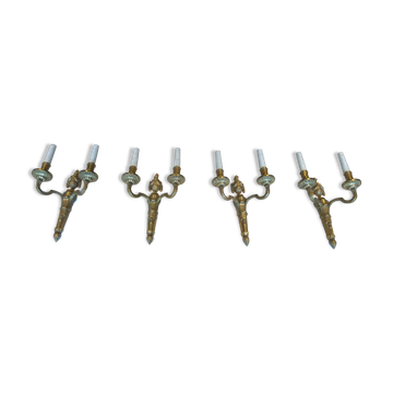 Set of 4 bronze wall lights in Louis XVI style.