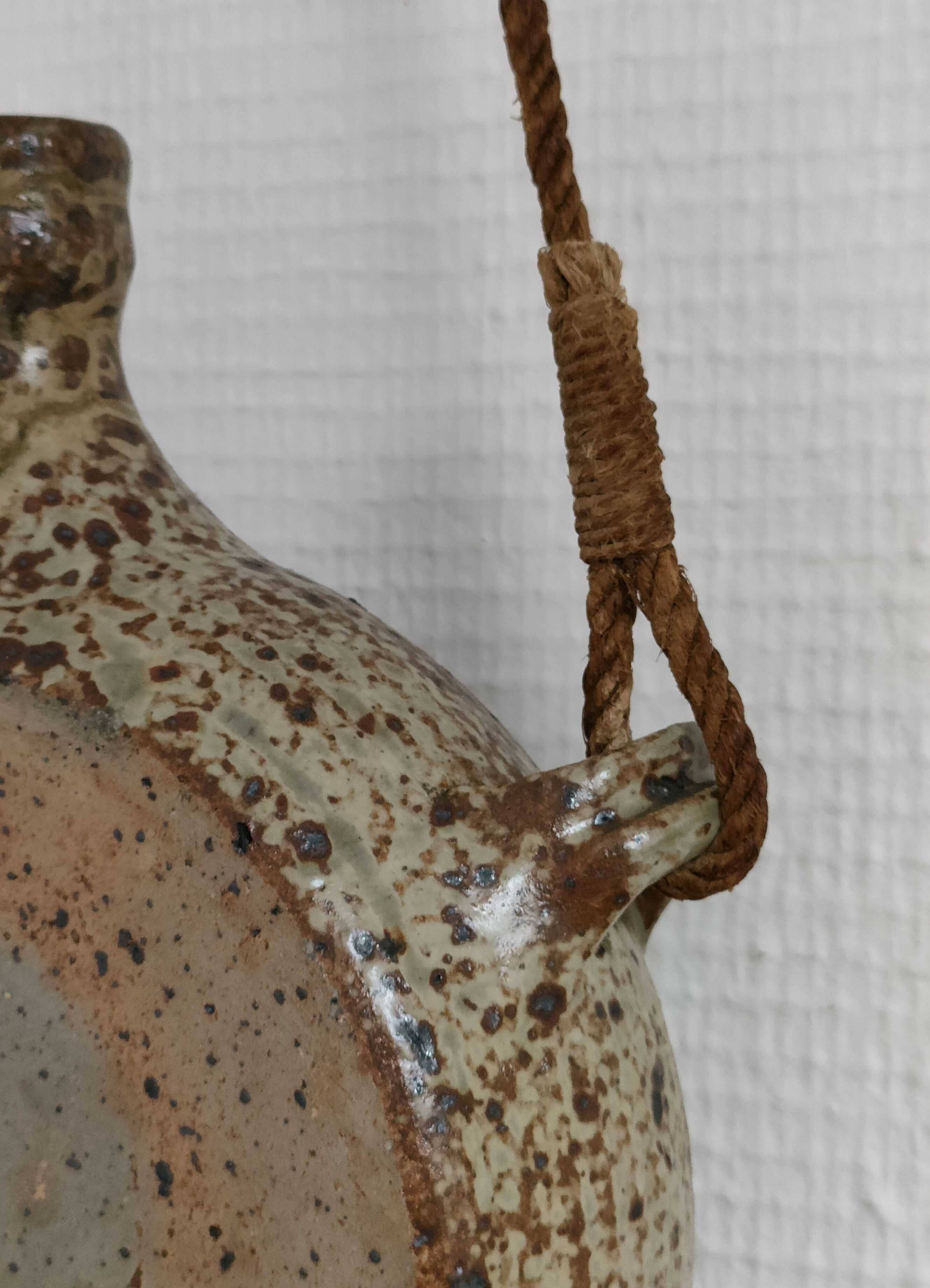 fountain in pyrity sandstone and vintage rope