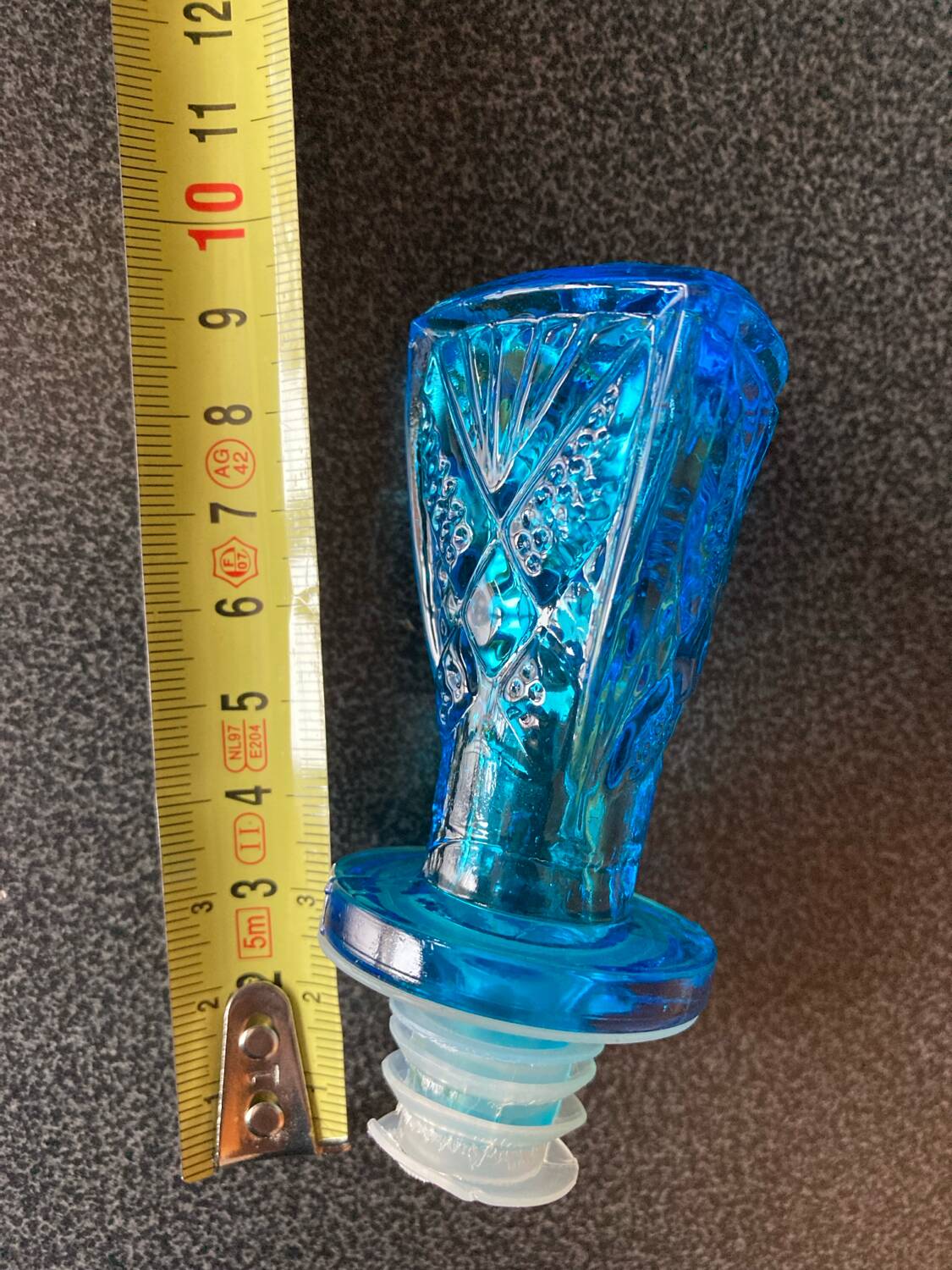 Blue chiseled glass bottle