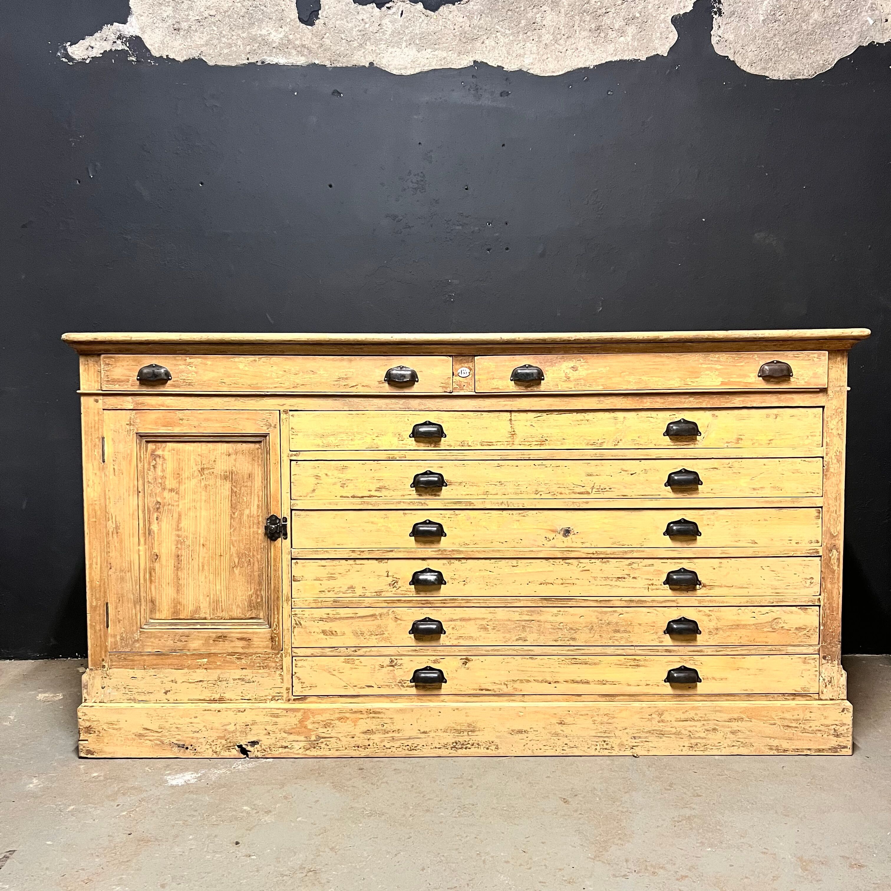 Old piece of furniture by trade with an architect's plan