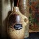 Single-flower vase, ceramic bottle by Max Idlas