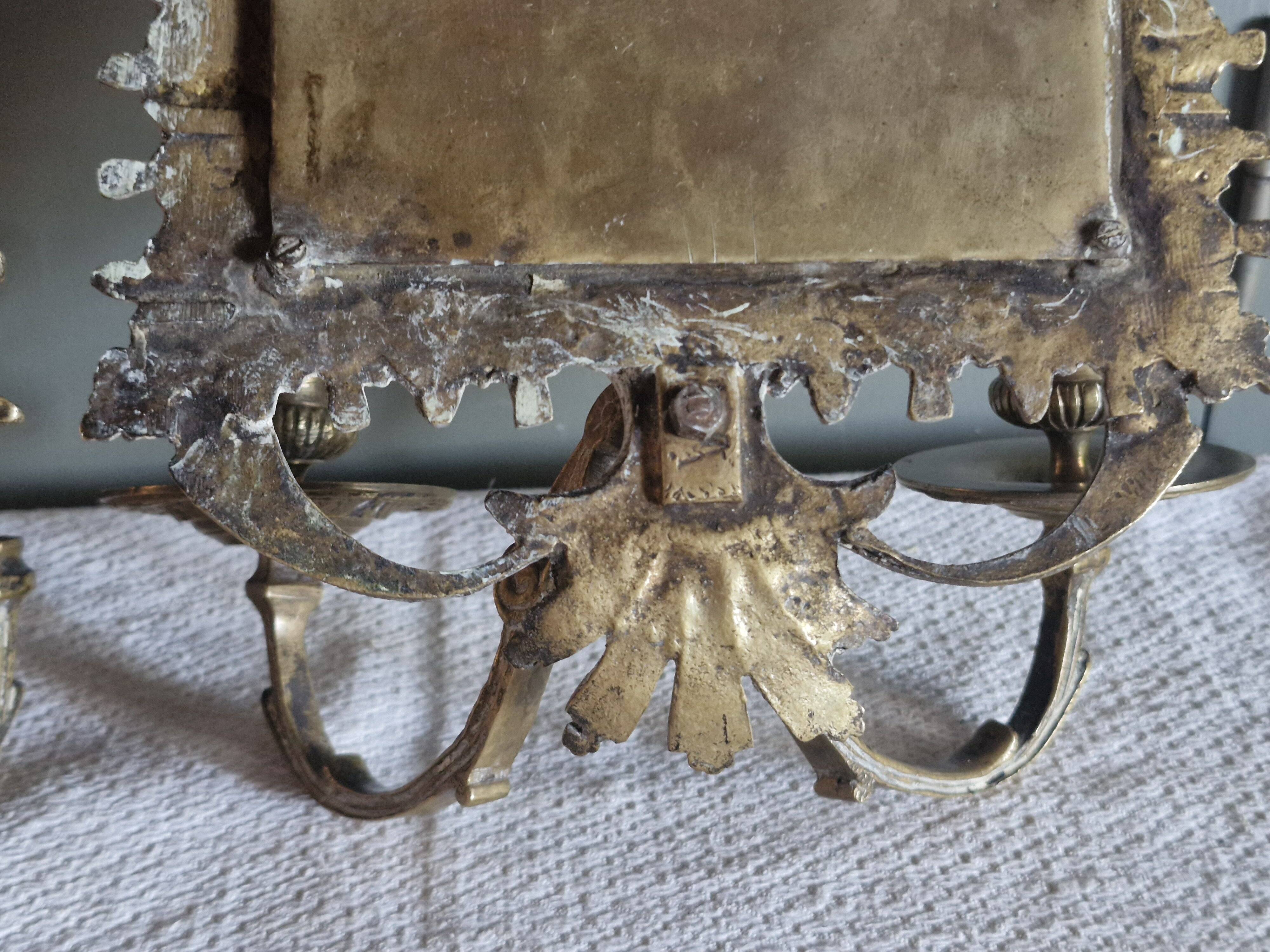 Pair of mirror sconces/candle holders in 19th-century bronze.