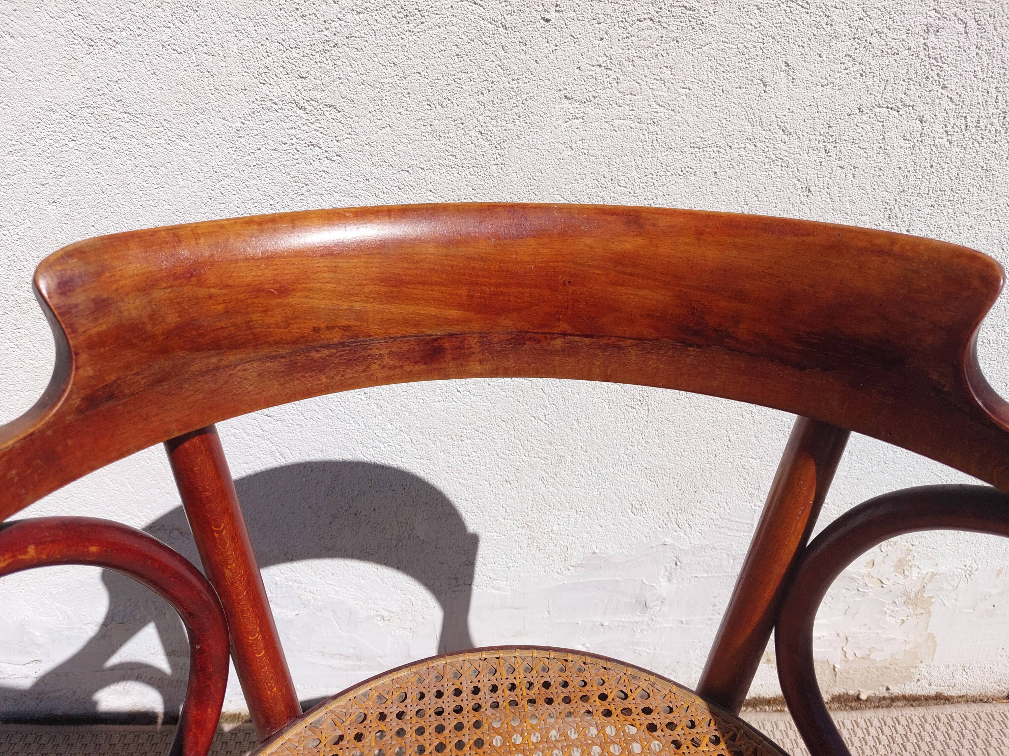 Paire de fauteuils cannés Fischel