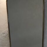 Vintage 1960 free-form mirror known as a rear-view mirror.
