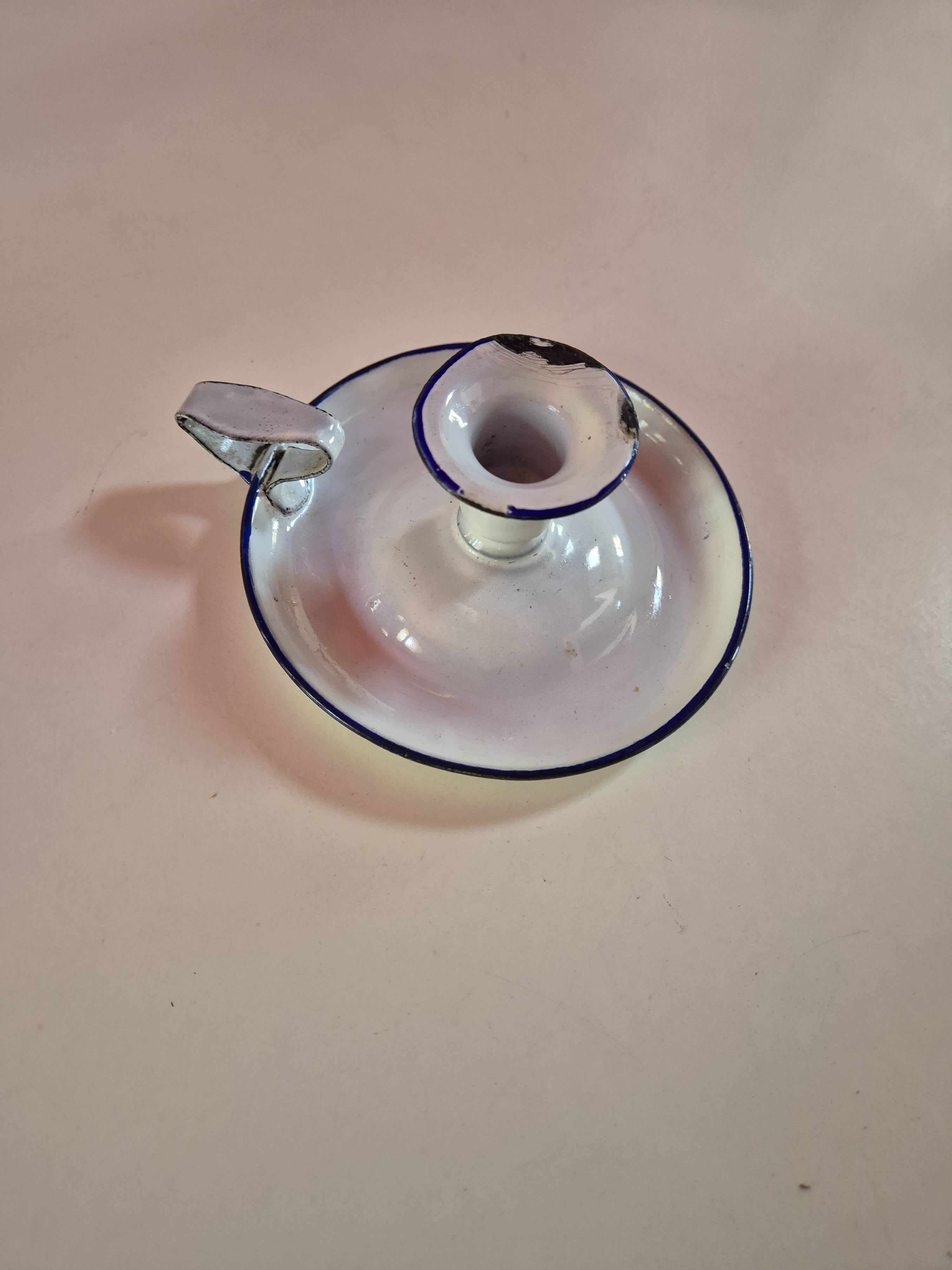 white enamelled metal candle holder with blue edges