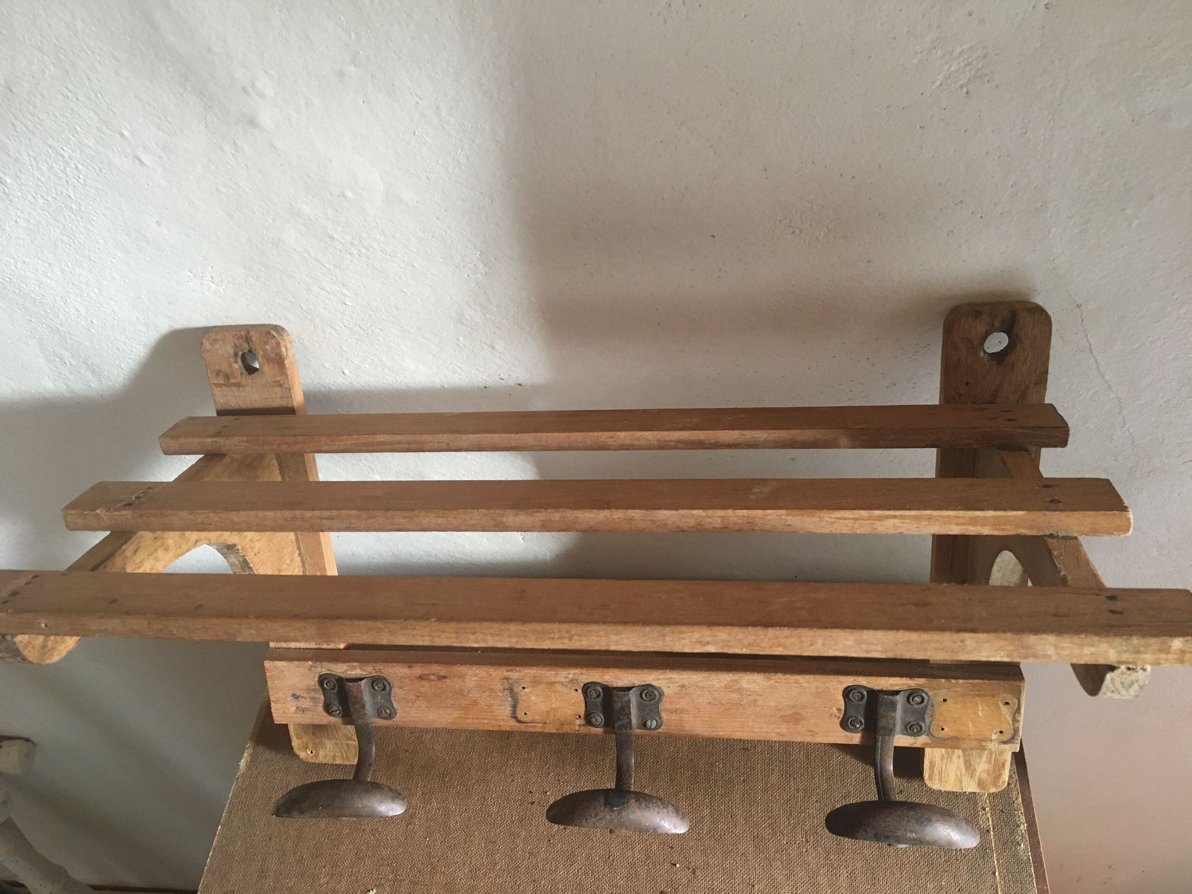 Wood shelf and metal hooks