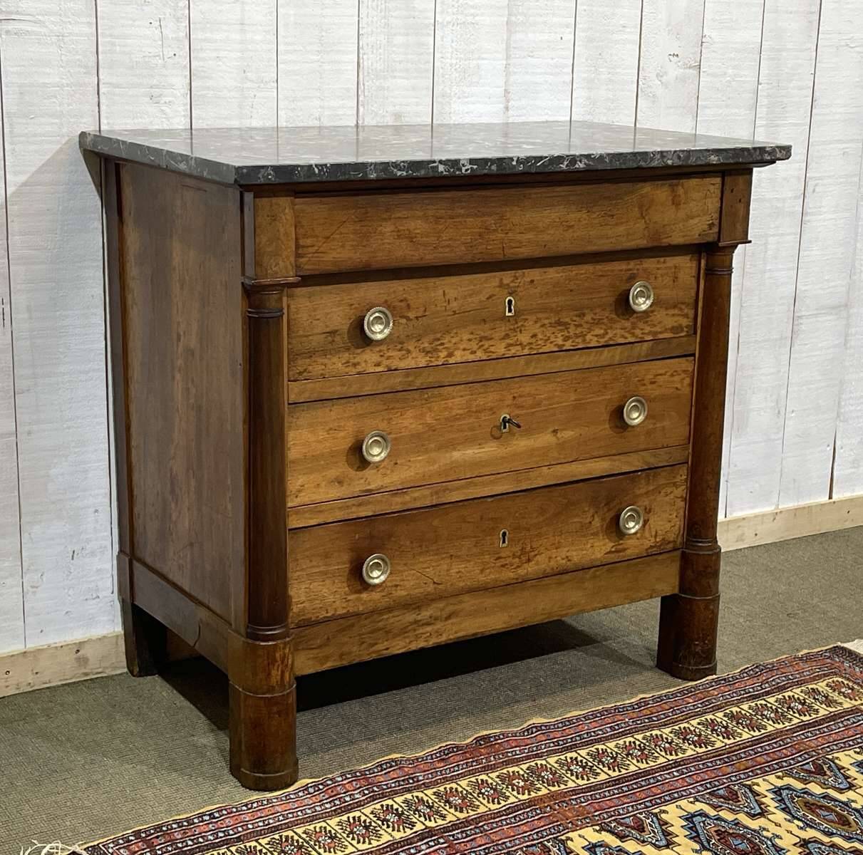 19th-century Empire commode in walnut with a grey St Anne marble top.
