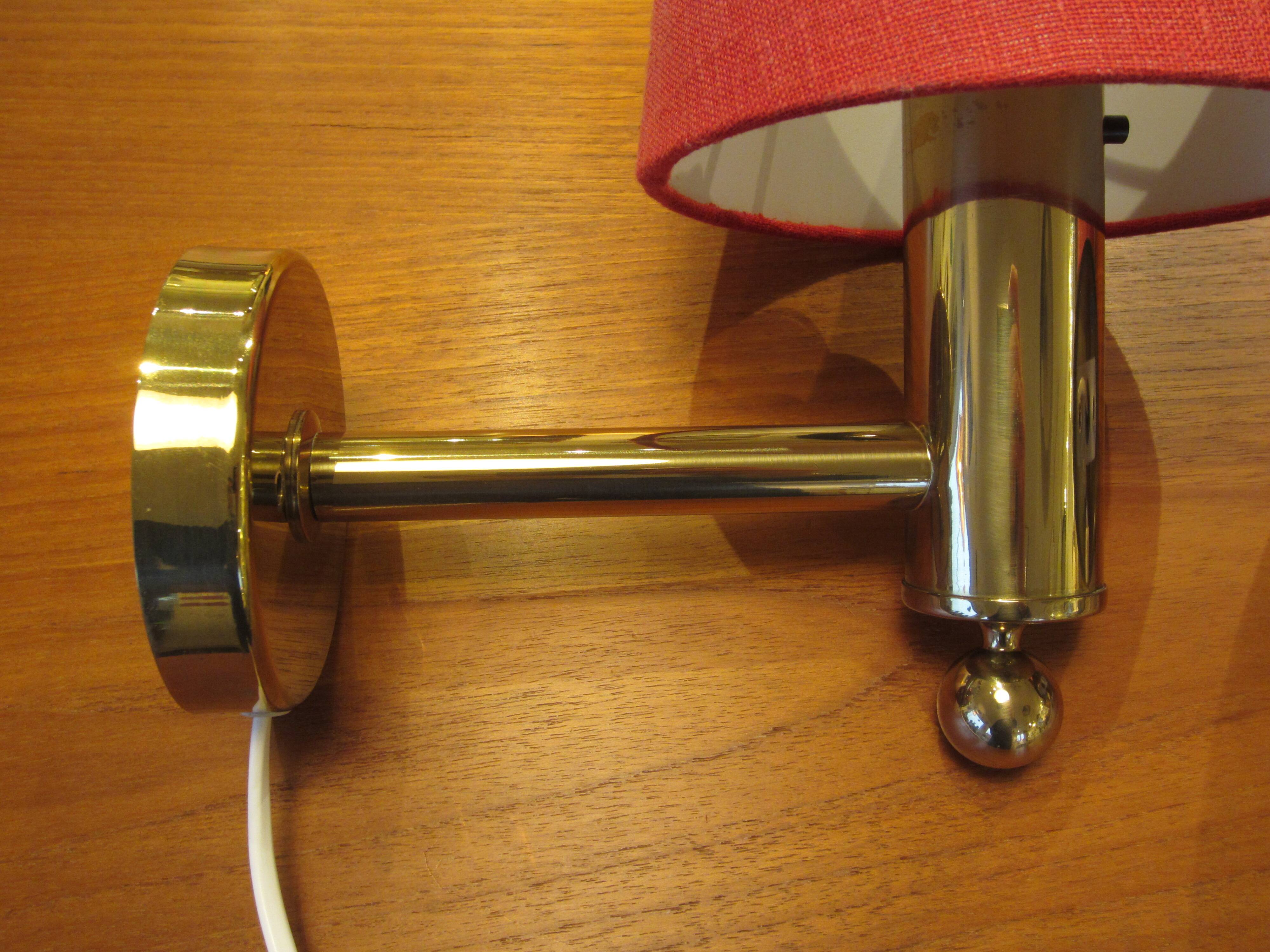 Pair of golden Scandinavian wall lights by Bergboms