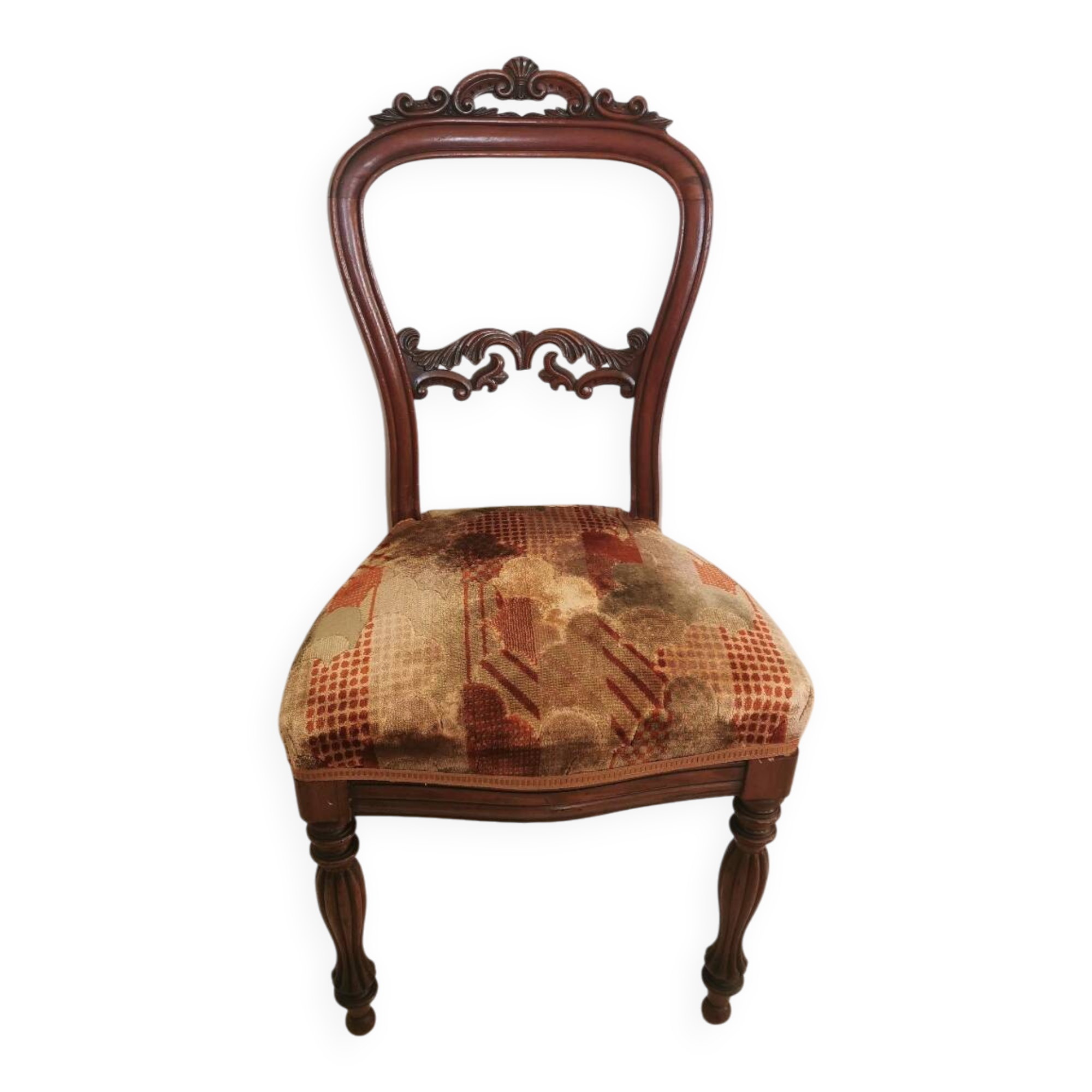 Carved wooden chair and velvet