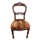 Carved wooden chair and velvet