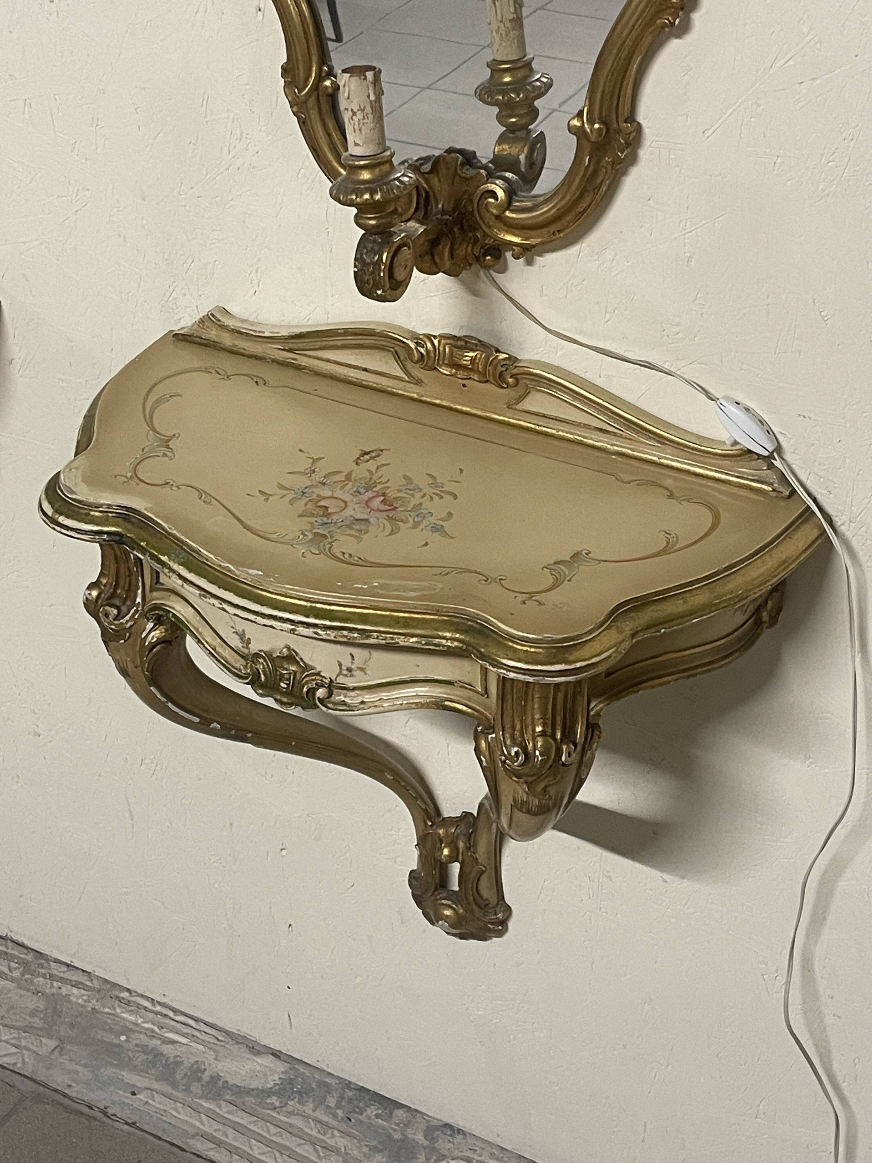 Pair of wall-mounted consoles with a mirror in Louis XV style.