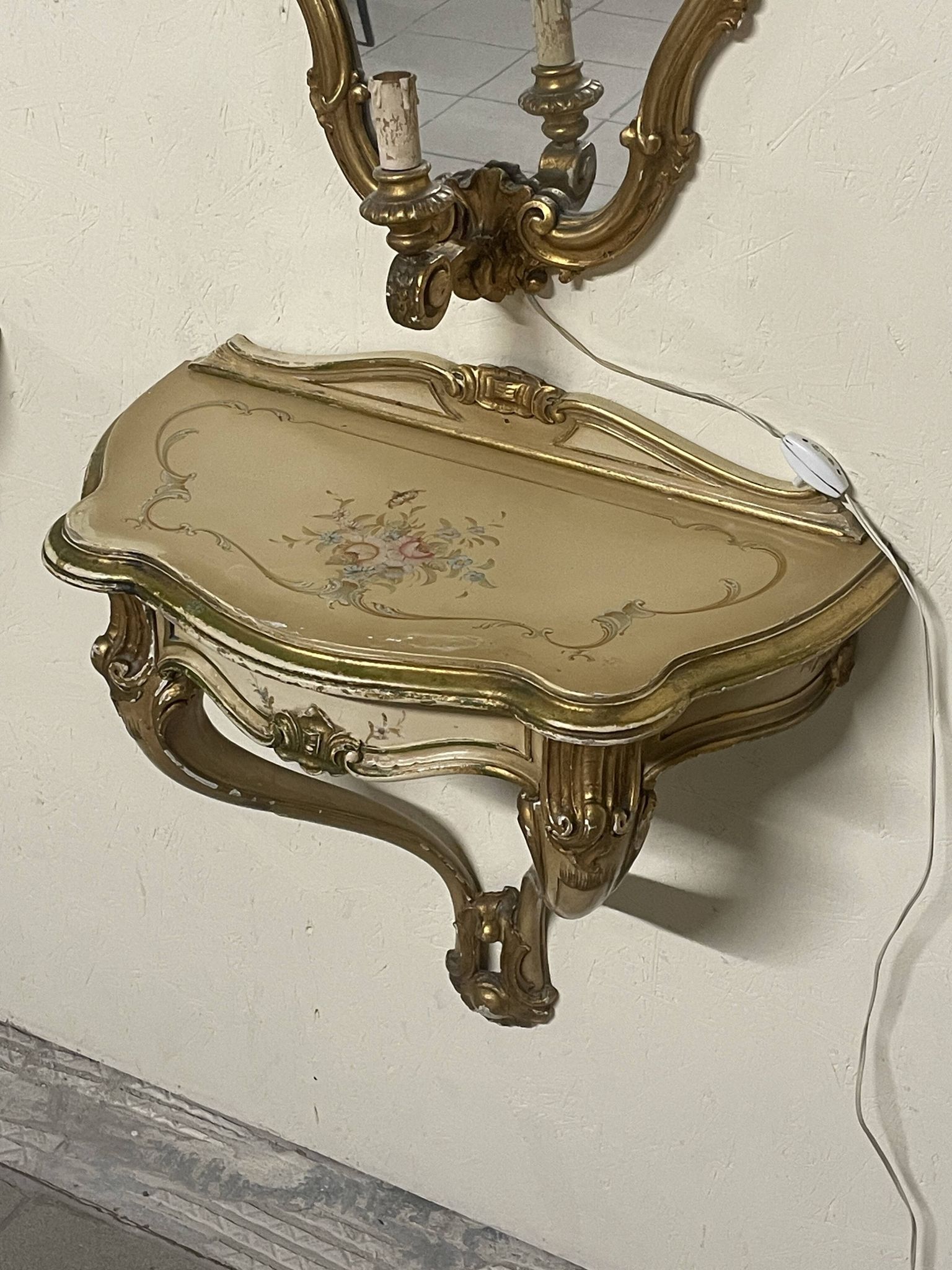 Pair of wall-mounted consoles with a mirror in Louis XV style.