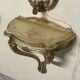 Pair of wall-mounted consoles with a mirror in Louis XV style.