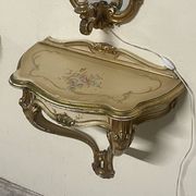 Pair of wall-mounted consoles with a mirror in Louis XV style.
