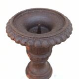 Pair of cast iron candlesticks