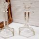 Paire bougeoirs verre