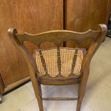 Antique wooden chair, cane seat