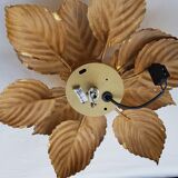 Golden metal flower sconce