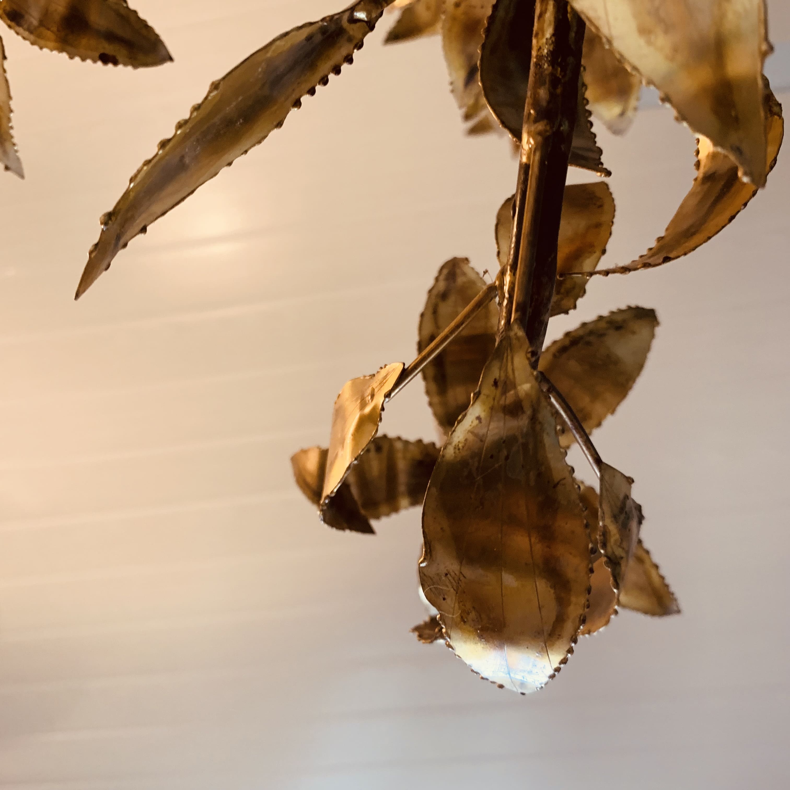 Vintage chandelier foliage decoration