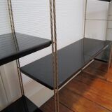 Black and gold metal tomado wall shelf