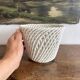 Woven ceramic plant pot