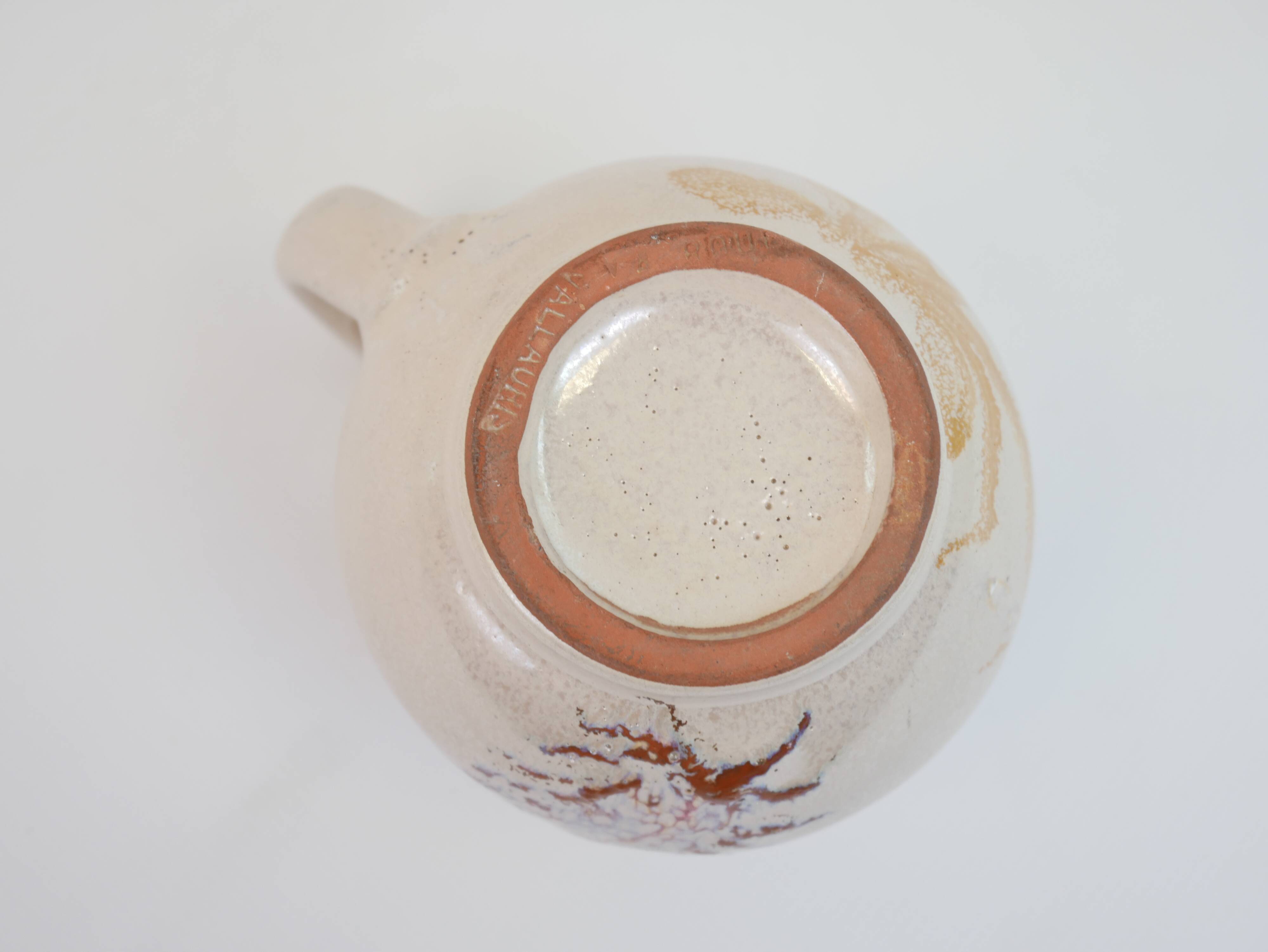 Pair of ceramic milk jugs signed La Roue Vallauris