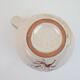 Pair of ceramic milk jugs signed La Roue Vallauris