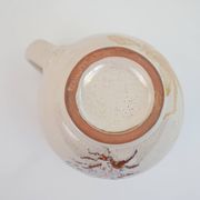 Pair of ceramic milk jugs signed La Roue Vallauris