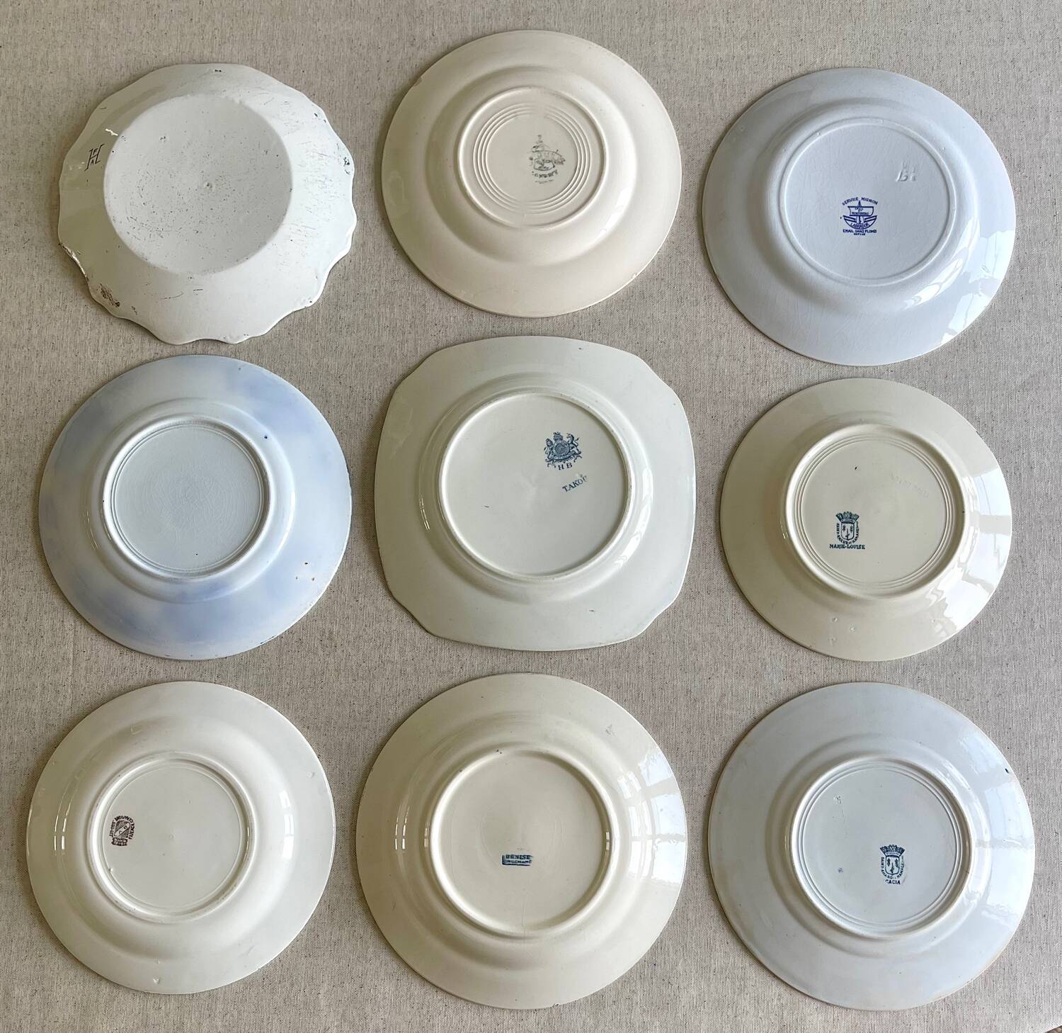 9 mismatched blue ironstone plates