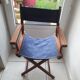 2 old director’s armchairs.