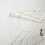 Minimalist white wire coat rack from mid-century Germany, 1960s.